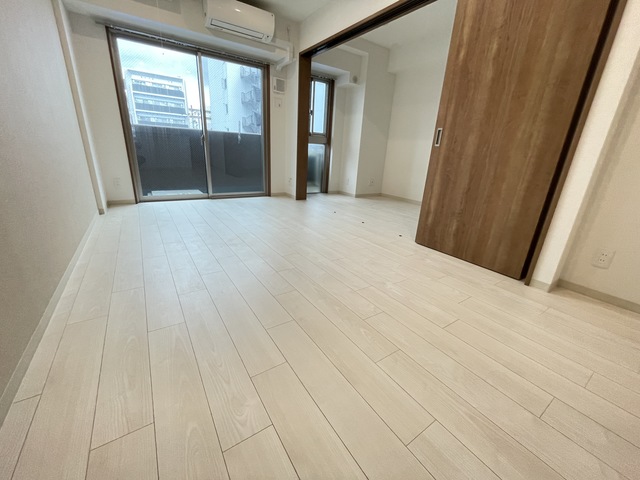グランコート茨木永代町の居間写真