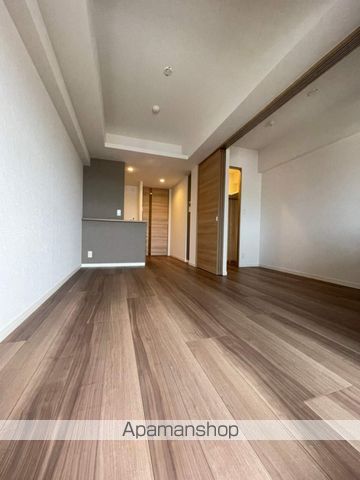 西鉄貝塚線 西鉄千早駅 徒歩7分 15階建 築6年の居間写真