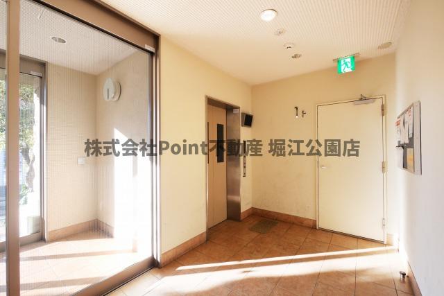 地下鉄長堀鶴見緑地線 今福鶴見駅 徒歩12分 8階建 築21年の玄関写真