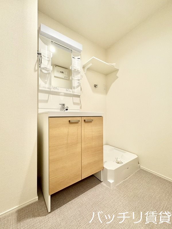 洗面設備　建築中の為　同型タイプ現状優先