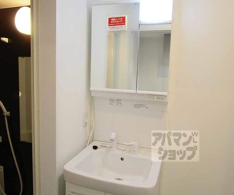 洗面設備　１０４号室の写真です。