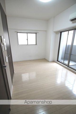 レオンコンフォート本町東の居間写真