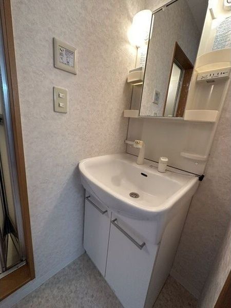 洗面設備　※写真は別号室です。
