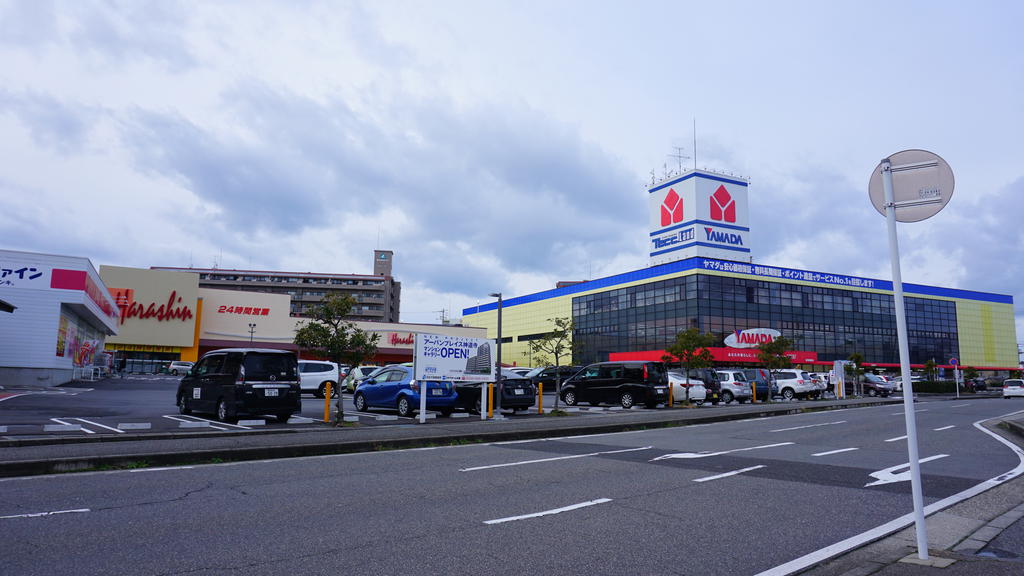 ショッピングセンター　原信・ヤマダ電機・ココカラファイン・・・（ショッピングセンター）まで970m