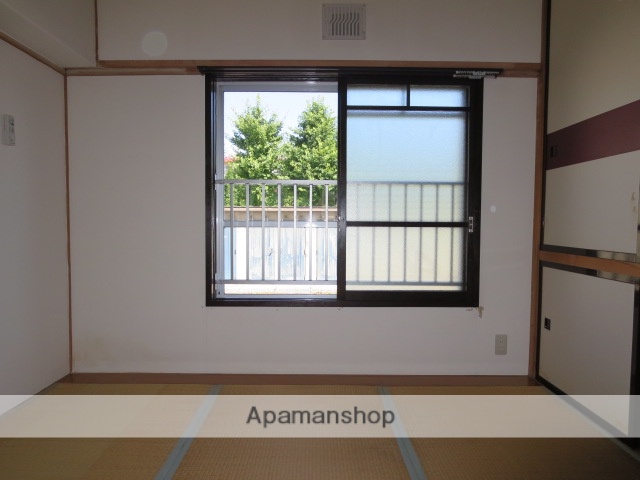 フォーシーズン滝川Iの居間写真