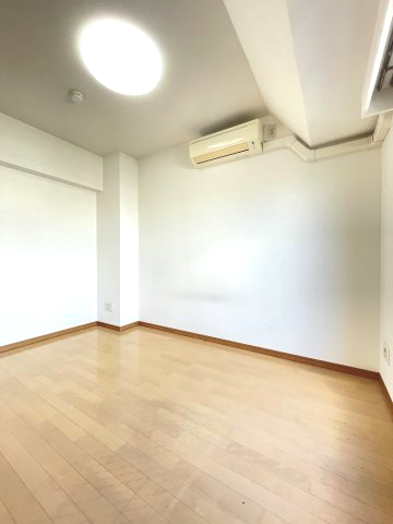 ジュネーゼ方南町の居間写真