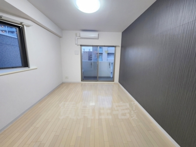 地下鉄御堂筋線 江坂駅 徒歩11分 9階建 築20年の居間写真
