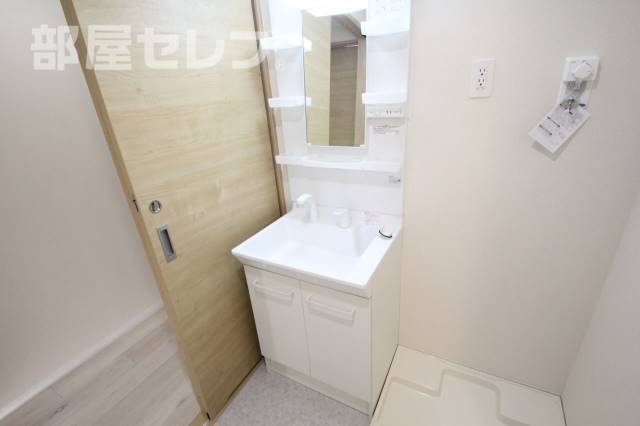 洗面設備　１０３号室の写真です。