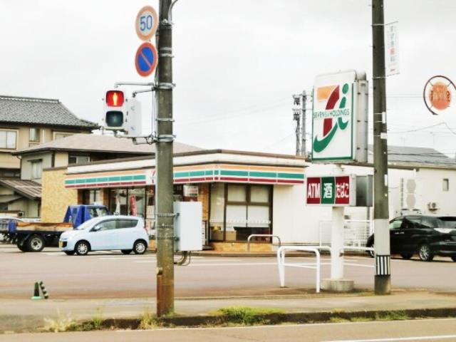 コンビニ　セブンイレブン長岡堤町店（コンビニ）まで700m