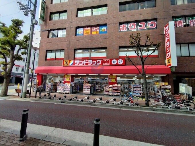ドラックストア　サンドラッグ 江坂駅前店（ドラッグストア）まで434m