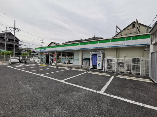 コンビニ　ファミリーマート 富田林津々山台店（コンビニ）まで1565m