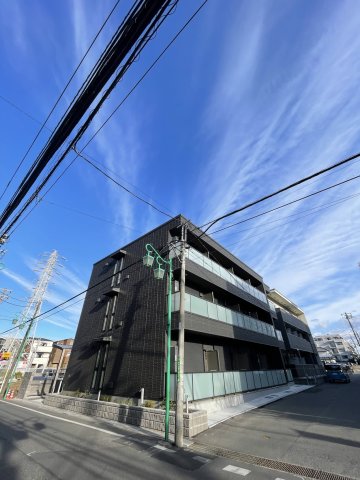 【船橋市本中山のマンションの建物外観】