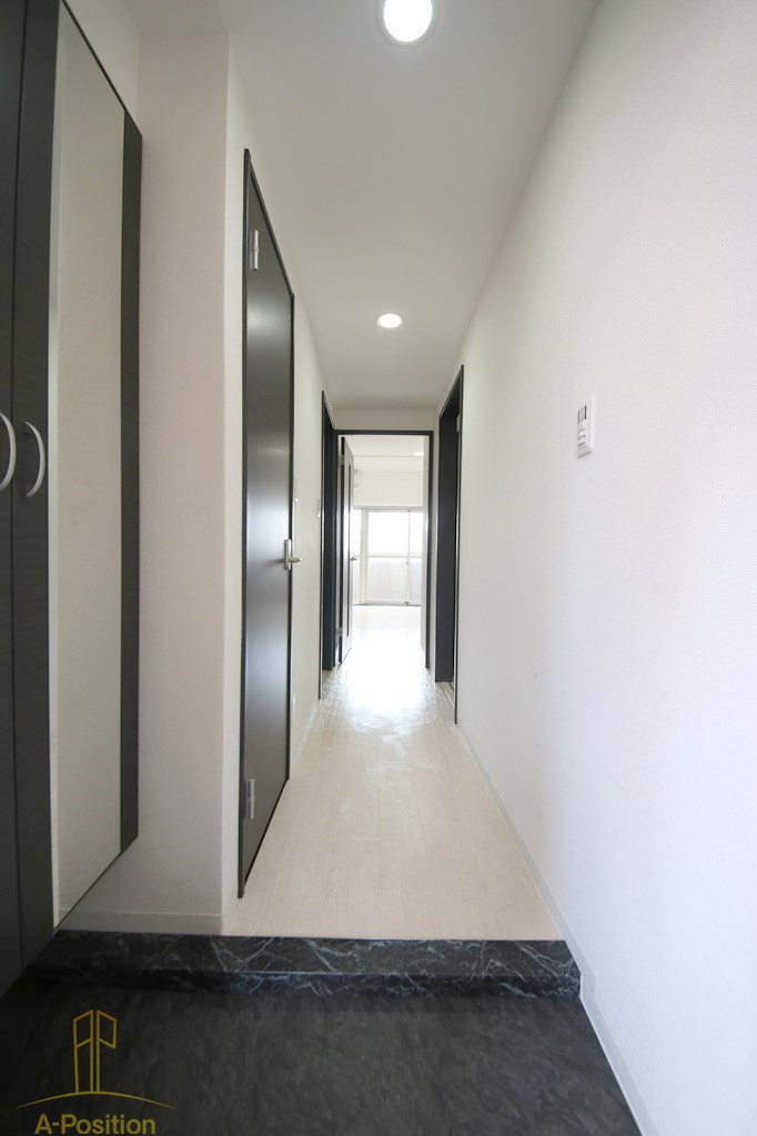 玄関　グランデカワノ真田山