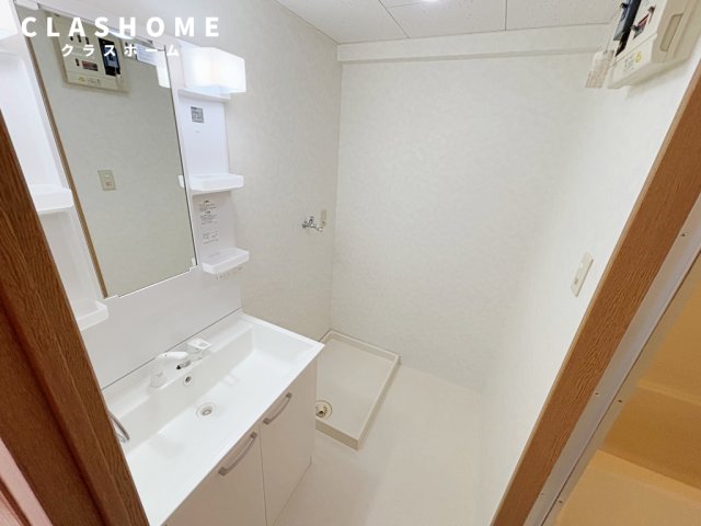 洗面設備　同物件の別部屋になります。