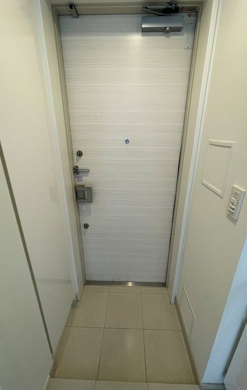 都営三田線 三田駅 徒歩5分 9階建 築15年の玄関写真