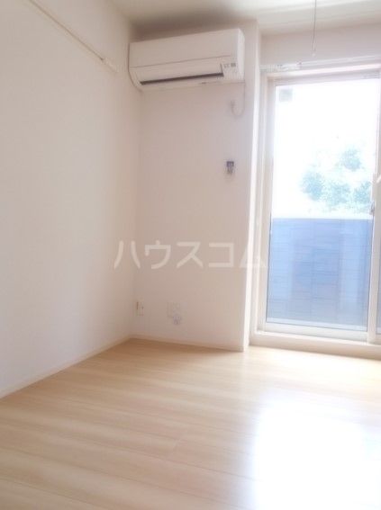 プルミエール柴崎の居間写真