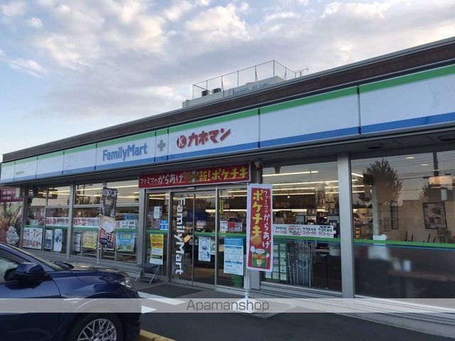 コンビニ　ファミリーマート（コンビニ）まで590m