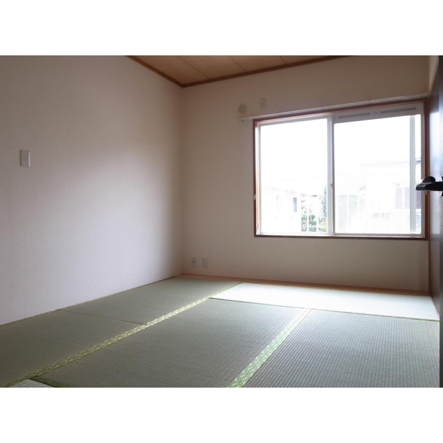 田代アパートの居間写真
