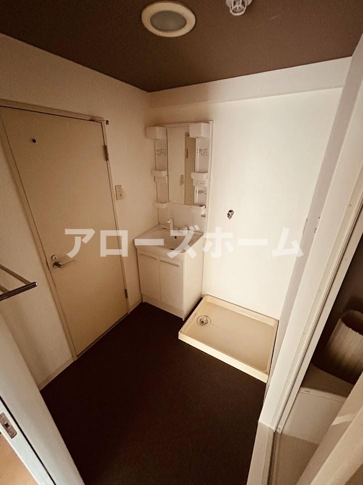 洗面設備　※室内改装完了前の写真です。