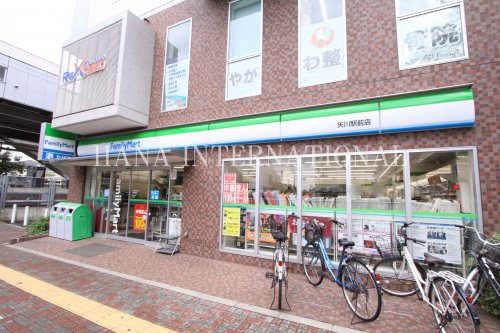 コンビニ　ファミリーマート（コンビニ）まで996m