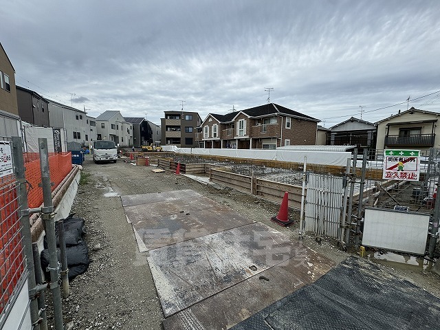 八幡市八幡山田のアパートの建物外観