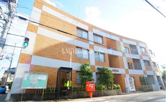 京都市右京区嵯峨野芝野町のマンションの建物外観