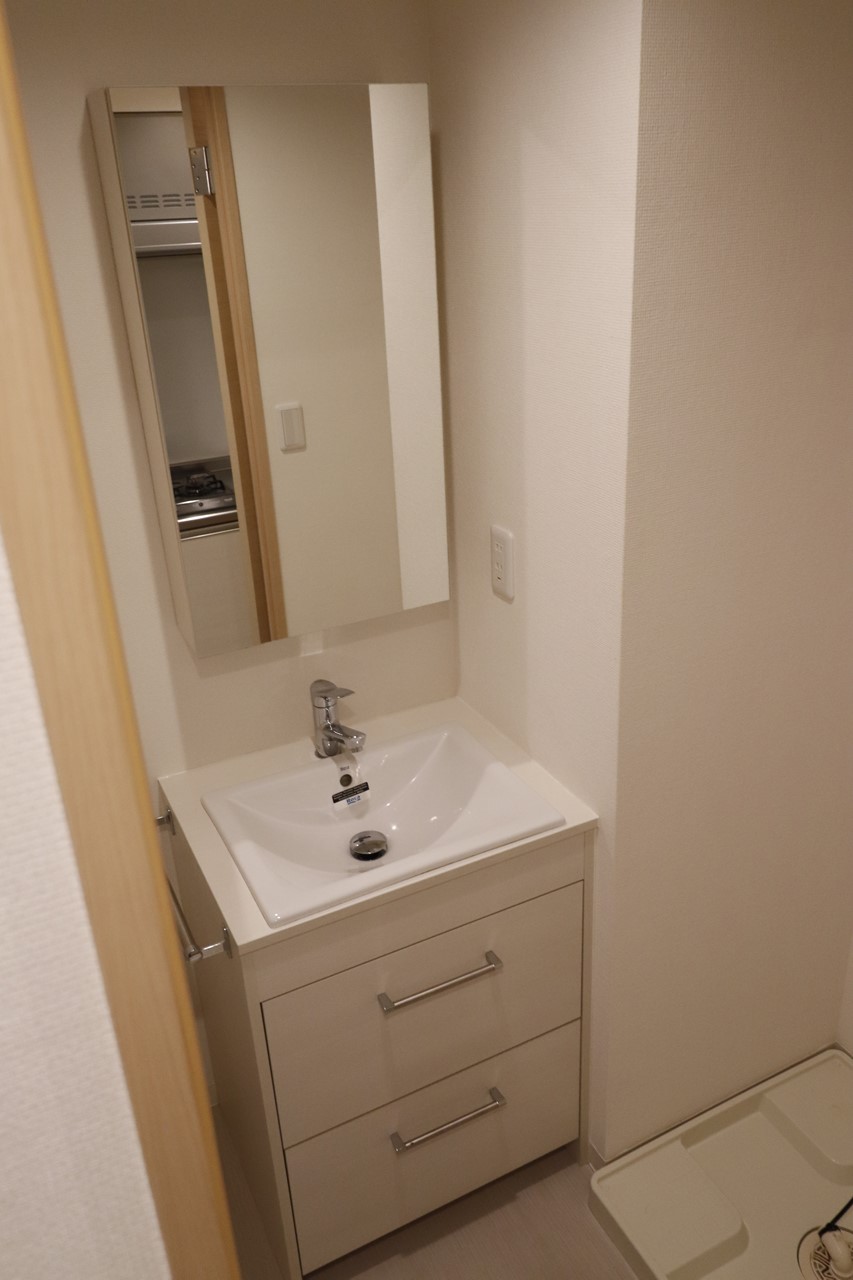 洗面設備　※同物件、別部屋の写真です。