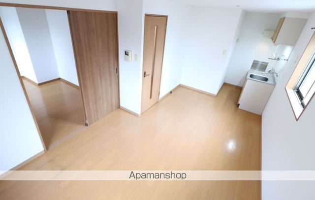 地下鉄七隈線 渡辺通駅 徒歩8分 4階建 築20年の居間写真