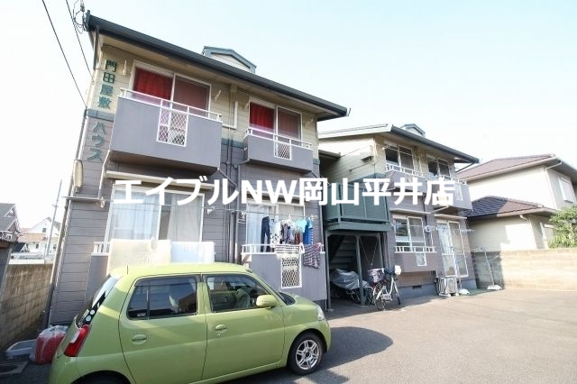 岡山市中区門田屋敷のアパートの建物外観