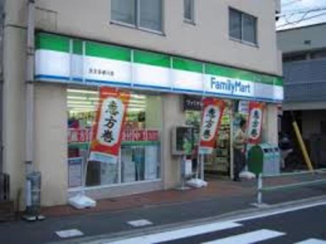 コンビニ　ファミリーマート京王多摩川店（コンビニ）まで421m