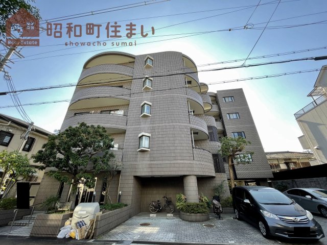 大阪市東住吉区南田辺のマンションの建物外観