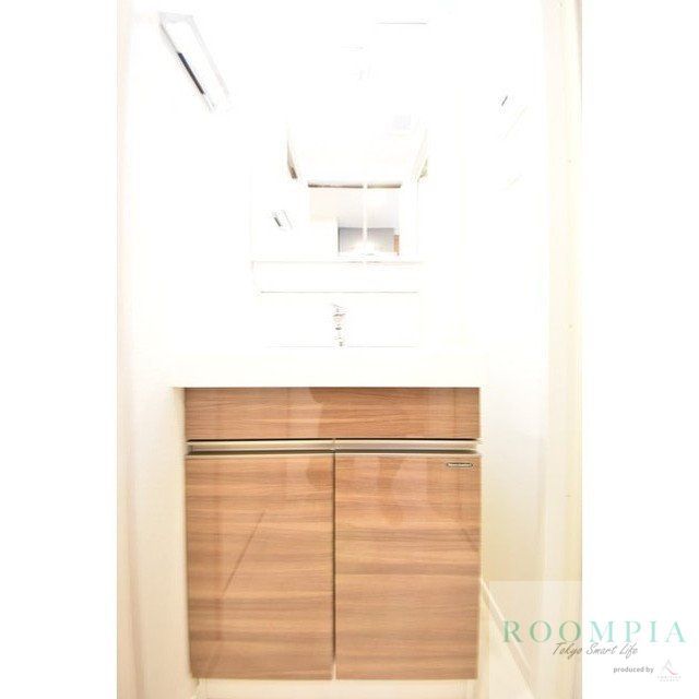 洗面設備　※同タイプの別のお部屋です。