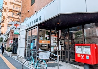 郵便局　足立谷中郵便局（郵便局）まで253m