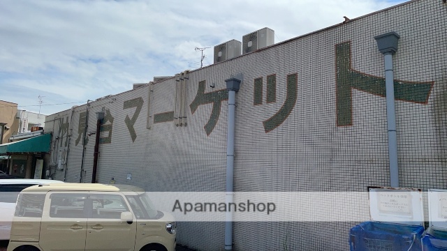 スーパー　竹見台マーケット（スーパー）まで492m
