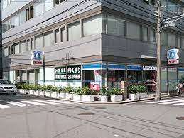 ドラックストア　ローソン＋ドラッグミック中津一丁目店（ドラッグストア）まで565m