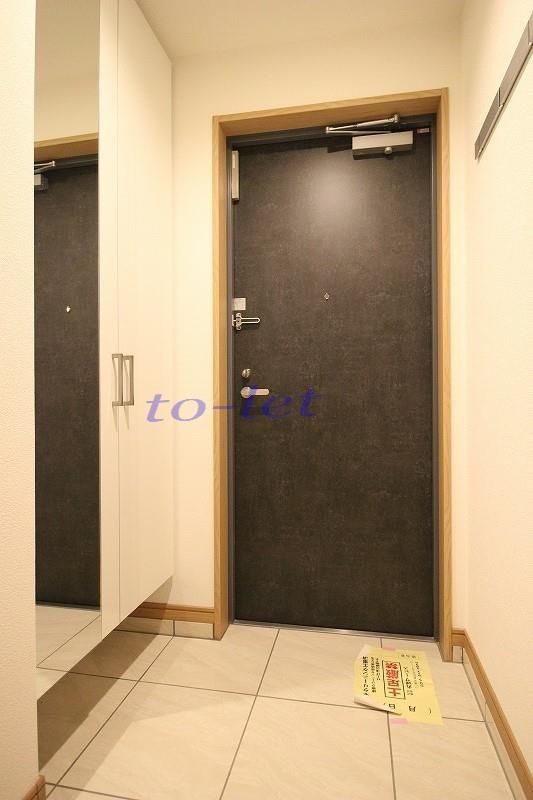 東急東横線 新丸子駅 徒歩4分 8階建 築6年の玄関写真