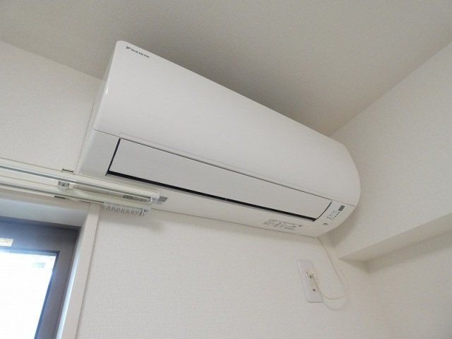 その他　エアコン一基