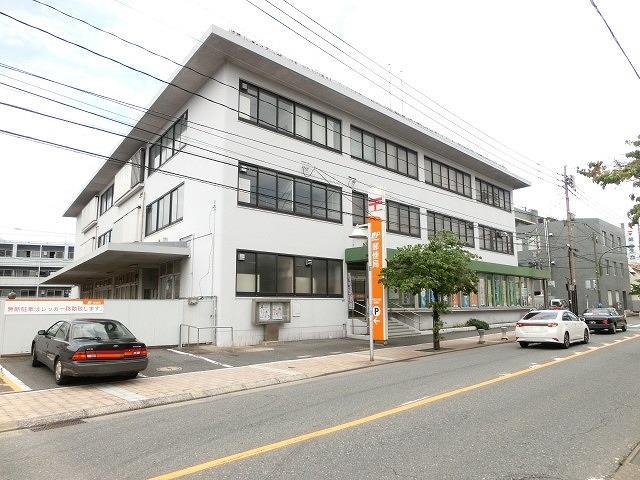 郵便局　折尾丸尾町郵便局（郵便局）まで810m