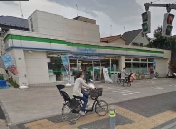 コンビニ　ファミリーマート 狛江市民グランド前店（コンビニ）まで1207m