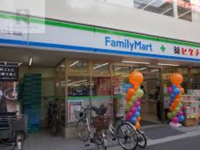 ドラックストア　ファミリーマート＋薬ヒグチ弥刀駅前店（ドラッグストア）まで386m