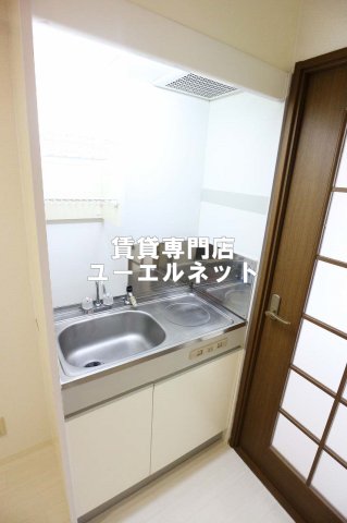 地下鉄御堂筋線 江坂駅 徒歩8分 5階建 築29年のキッチン写真