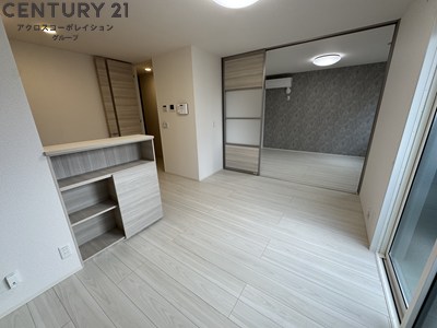 居室・リビング　洋室と合わせて使用可能な広々リビング