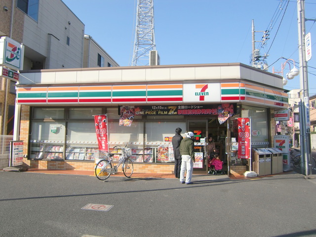 コンビニ　セブンイレブン足立青井駅前店（コンビニ）まで89m