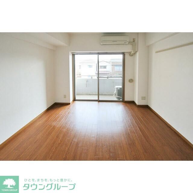 メルベーユ池之内の居間写真