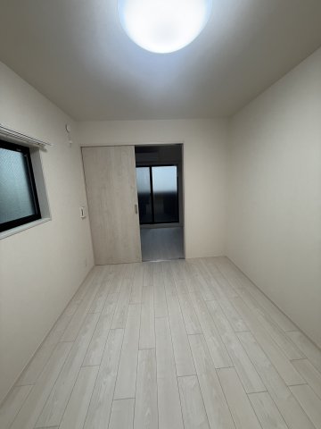 ハーモニーテラス内代町IIの居間写真