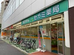 ドラックストア　ドラッグセガミ成田東店（ドラッグストア）まで1076m
