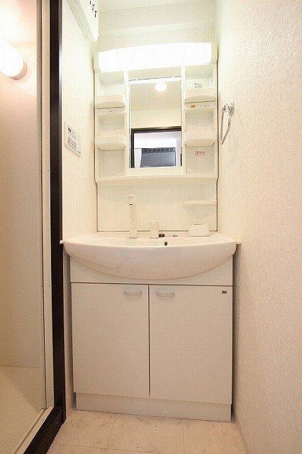 洗面設備　同物件別号室のものです。
