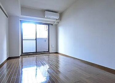 居室・リビング　別部屋の写真を使用しております。