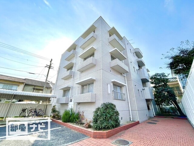 【プレジール飛鳥の建物外観】