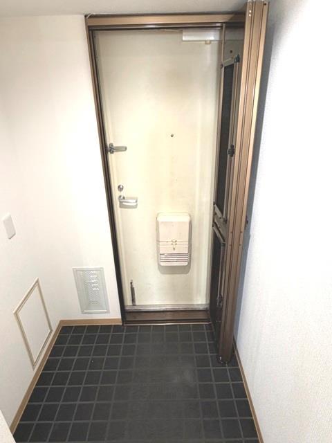 コープ野村高取台の玄関写真